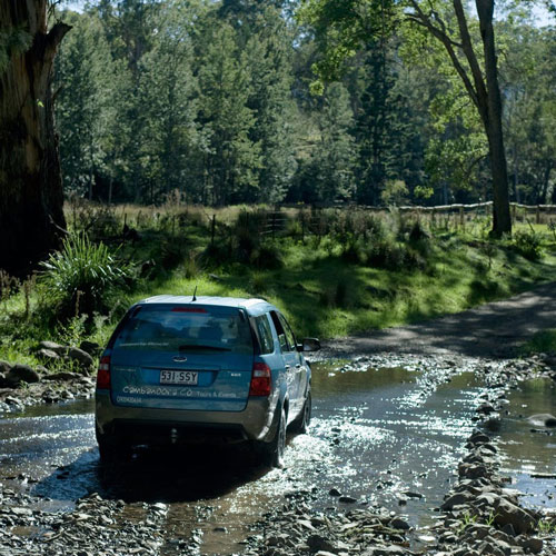 4WD crossing river at 14 River Crossing